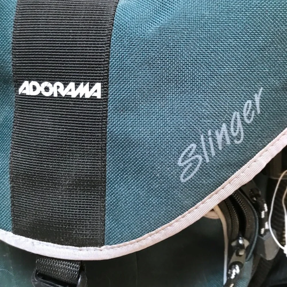 Adorama Sling Camera Bag. Large, W/ waist and sling strap. Multiple pockets, NEW